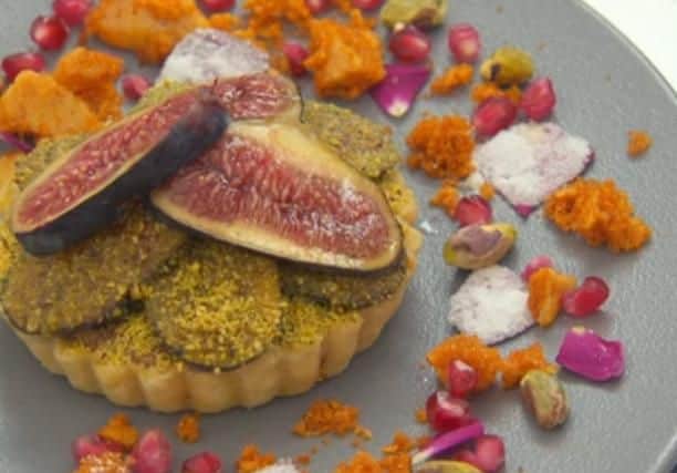 Lorna's orange blossom pistachio and honey frangipane tart topped with chopped figs.