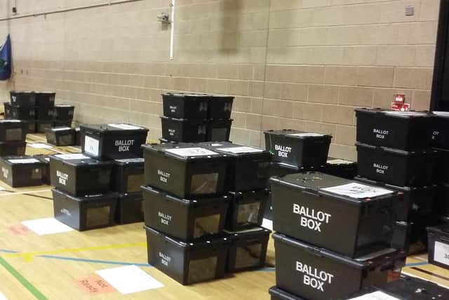 The ballot boxes piled up in the sports hall, prior to the count.
