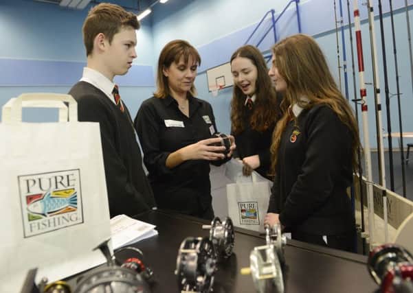 Duchess's Community High School careers day.
 Lindsey Finnie of Pure Fishing talks to pupils Josh McDonald, Aimee Anderson and Erin Murray.
Picture by Jane Coltman