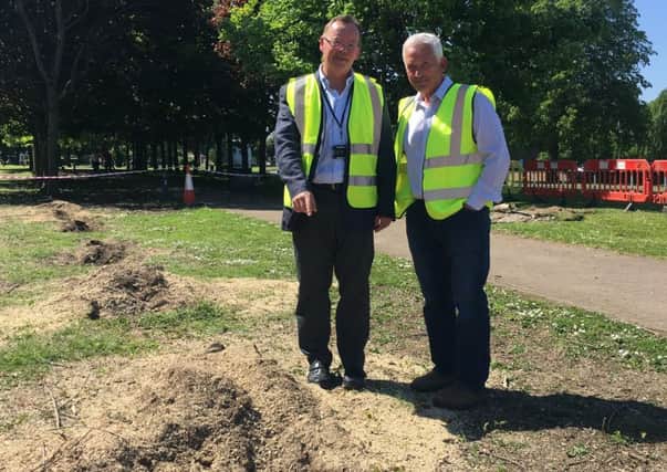 Northumberland County Council leader Peter Jackson and Coun Glen Sanderson, cabinet member for environment and local services, oversee the removal of stumps of the trees that were cut down earlier this year.