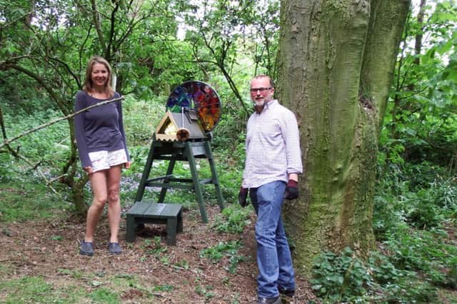Sue Courty, from Little Acorns, with artist Richard Molineux and the kaleidoscope.