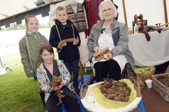 St Paul's RC Pupils with Kate Allport from North Northumberland Spinners at the Children's Countryside Day at Wooler.
 Picture by Jane Coltman