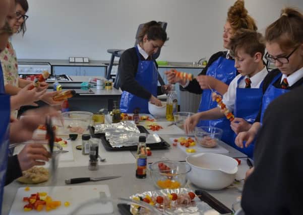 Year 9 pupils at the Duchess's Community High School try something new for Healthy Eating Week.