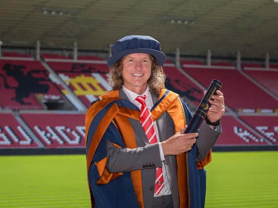 Gary Fildes, director of Kielder Observatory, with his Honorary Fellowship of the University of Sunderland.