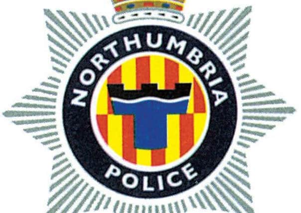Northumbria Police badge.
