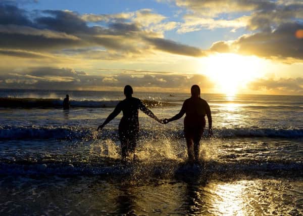 A previous skinny dip at Druridge Bay. Picture by Owen Humphreys/PA