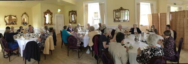 Members of Lesbury WI enjoy a 95th anniversary tea at Eshott Hall.