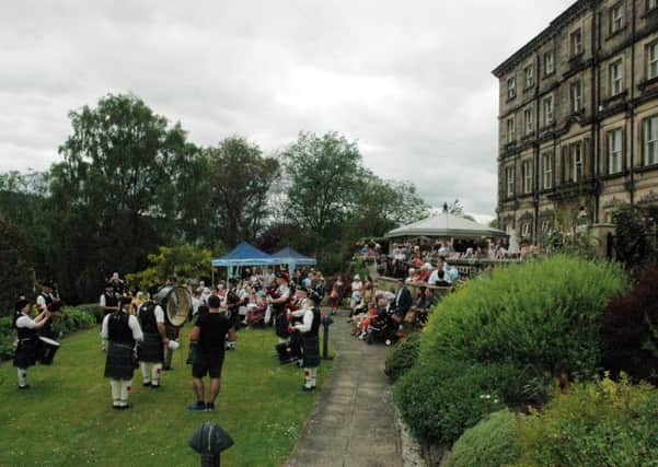 Tea on the Terrace at Rothbury House - Rothbury Highland Pipe Band performing for the crowds.