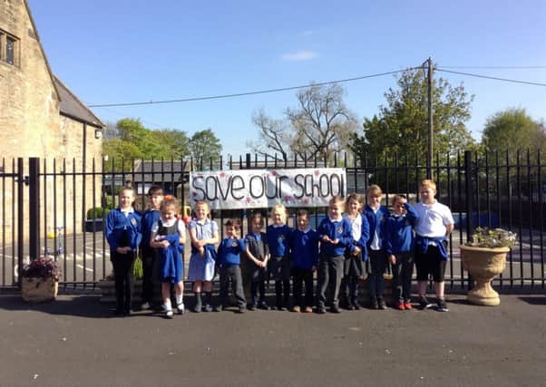 Children at Acklington C of E First School fighting against the closure. Some of these pupils have since left the school.