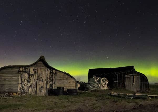 The aurora on Holy Island  by Jane Coltman