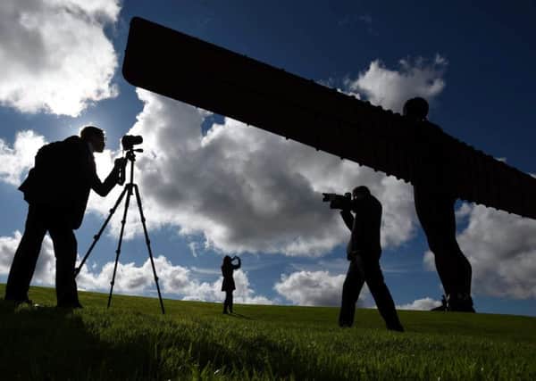 Students from Lord Lawson of Beamish Academy in Durham  photographing the Angel of The North in Gateshead. Picture by Paul Kingston/NorthNews