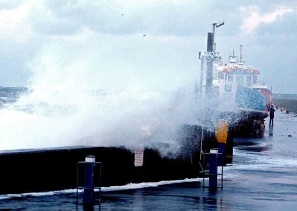 Big waves with the tidal surge at Seahouses., Picture by Jane Coltman