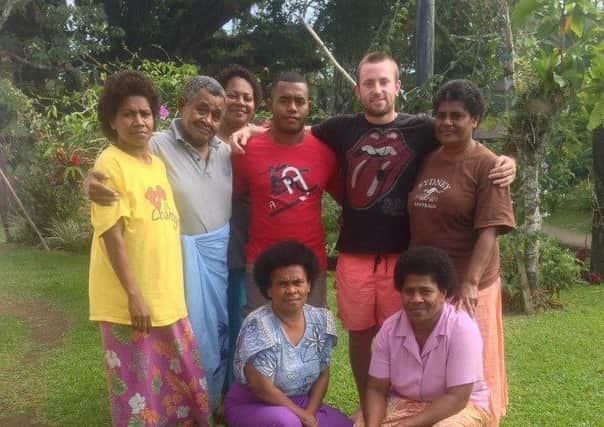 Gary Hedley with members of the family he stayed with in the Nausori region of Fiji in 2014.