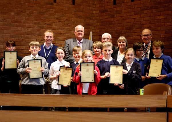 Pupils from Swarland Primary School, Horton Grange Primary School, Hipsburn Primary School, Bothal Primary School, Central Primary School and Newminster Middle School receive certificates from councillors.