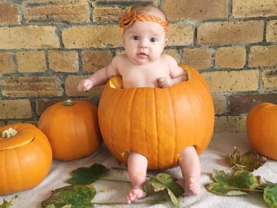 Three-month-old Ella Wake makes a very cute pumpkin.