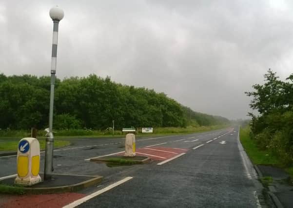 The crossing point on the A1068. Hadston is to the right, while Druridge Bay Country Park is to the left.