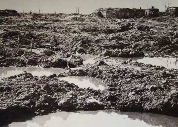 A German bunker 'protected' by a sea of mud and water-filled shell holes.