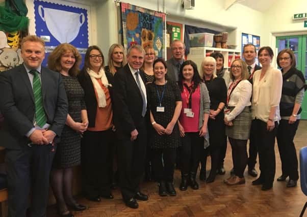 Children and Families Minister Robert Goodwill with councillors, council staff, school staff and nursery staff in Bedlington.