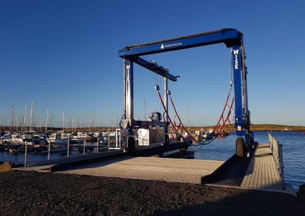 The new dock and boat hoist at Amble Marina.