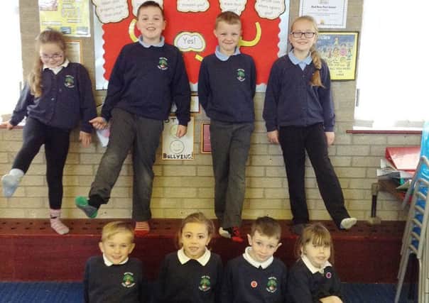 Pupils at Red Row First School wear odd socks to back Anti-Bullying Week.