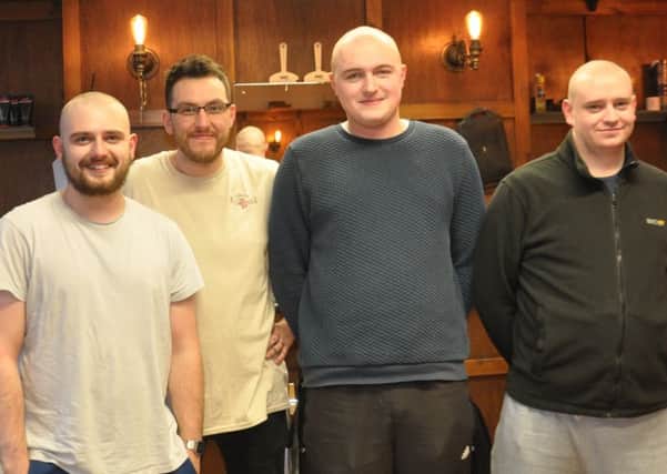 From left: Matt McDonogh, barber Paul Emery, Liam Tyson and Tom Dodd. Image by Terry Collinson