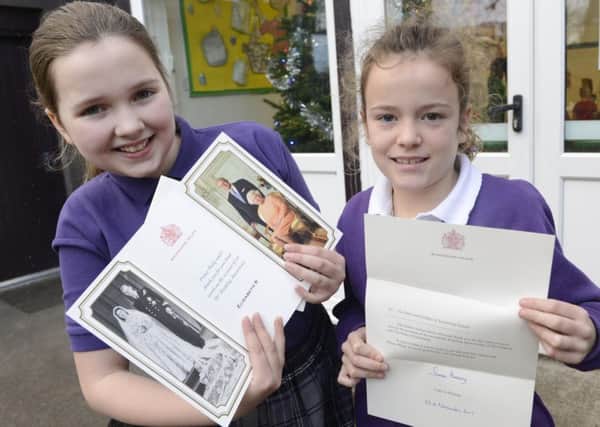 Swansfield Park pupils Freya Bridges and Lola Campbell, both age 9, with the correspondence from Her Majesty The Queen. Picture by Jane Coltman