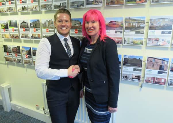 Signature's managing director, Mark Small, and Coast and Castle's managing director, Karen Parker.