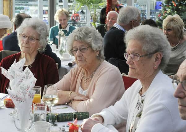 Guests listen to the singing at The Elderberries Christmas party at The Alnwick Garden. Picture by Jane Coltman