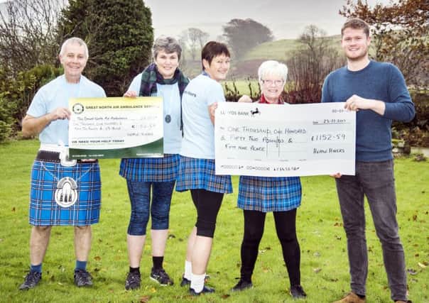 Hepple fundraisers, from left, Peter Bates, Jenny Bates, Linda Glendinning and Mal Patterson han over a cheque to GNAA representative Ben McWilliams.