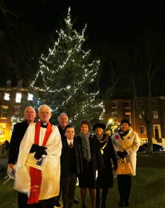 Christopher Whiting, who switched on the Tynemouth tree lights, watched by, left ro right, President David Milligan MC, Reverend Timothy Duff, President Murray Shand, Mayor Norma Redfearn, Coun Cath Davis and Coun Karen Bulger.