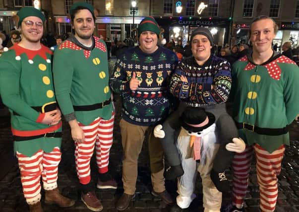 Santa's little helpers at The Big Sing 2017 in Alnwick Market Place.