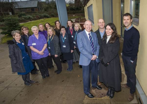 Rothbury Practice executive GP, Dr Jack Lamb (front right) and partners Dr Billy Hunt and Dr Marian Mather (centre) with Dr Mike Guy (left), from Northumbria Healthcare, and multi-disciplinary practice staff.