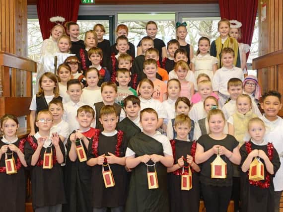 Pupils from St Paul's RC Primary School in Alnwick ready for their festive performances. Picture by Jane Coltman