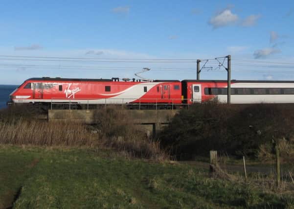 The first train in the now familiar Virgin East Coast livery approaching Berwick on March 1, 2015.