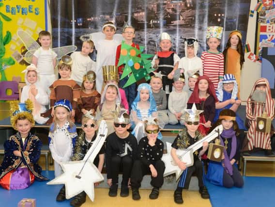 The younger pupils at Swansfield Park Primary School performed Rock The Baby as their festive treat for family and friends. Picture by Jane Coltman