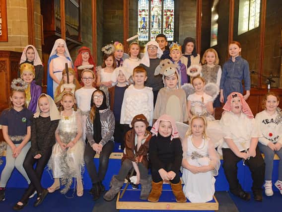 Pupils from Amble County First School performed It's A Baby. Picture by Jane Coltman.