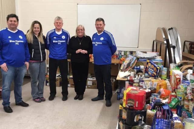 From left, Mal Usher (Blue Flames), Rachel Edge, Martin Wright, Jean Bell and Billy Usher (Blue Flames) with some of the items.
