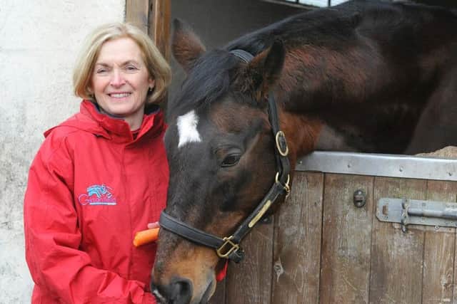 Susan Corbett with Kutub, who has total earnings of more than 750,000. Picture by Jane Coltman