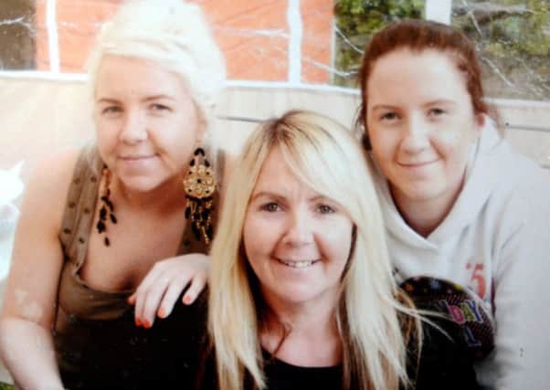 Cassie Hayes, right, with sister Nadine, left, and mum Tracy, centre. Picture: North News & Pictures