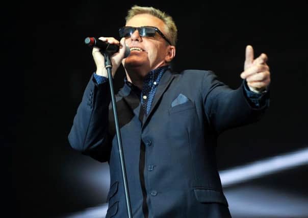 Suggs controls the crowd at Lytham Festival