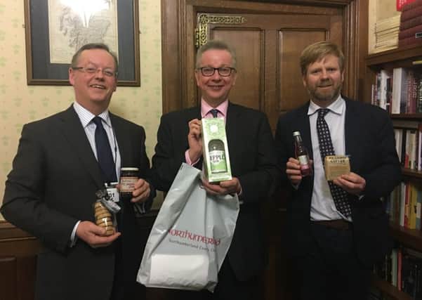 MP Michael Gove (middle) with Northumberland county councillors Peter Jackson and Nick Oliver.