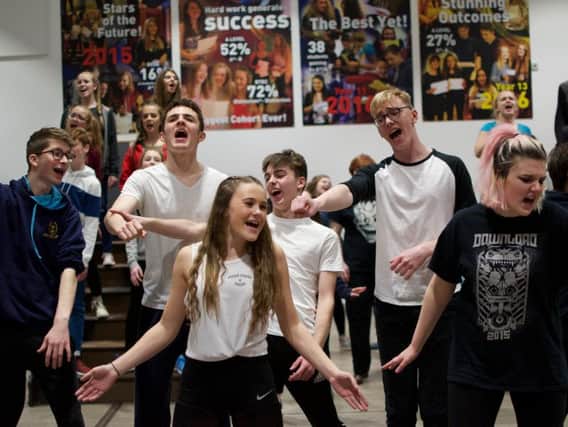 Duchess's Community High School students in rehearsal for We Will Rock You. Picture by Jess Rix