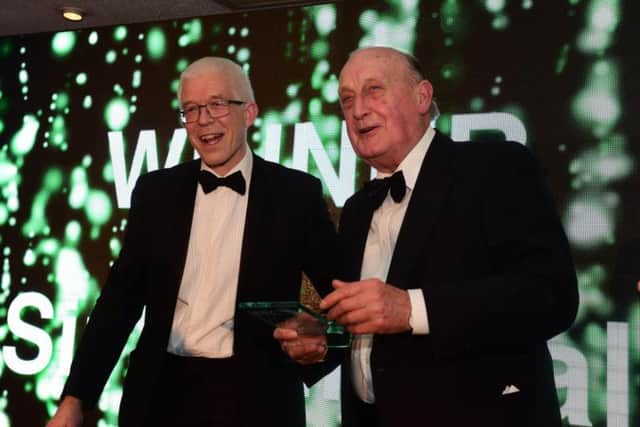 North of Tyne weeklies editor Paul Larkin presents the Lifetime Achievement Award to Sir John Hall. Picture by Kevin Brady