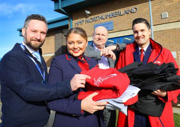 Virgin Trains staff deliver old uniforms to HMP Northumberland for the recycle scheme.