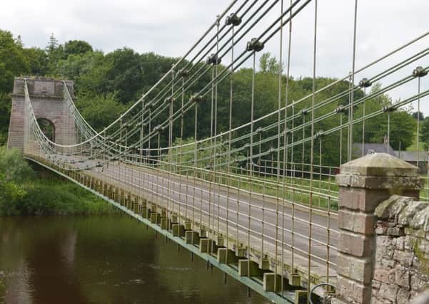 The Union Bridge, also known as the Union Suspension Bridge or Union Chain Bridge, is a suspension bridge that spans the River Tweed between Horncliffe, Northumberland, England and Fishwick, Berwickshire, Scotland