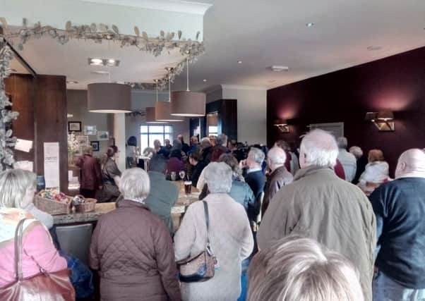 The meeting of concerned residents and business owners at Purdy Lodge, Adderstone Services.