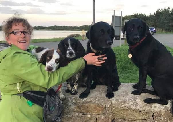 Hannah Butters with her dogs Minnie, Dasy, Tally and Willow.