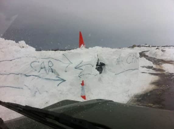 Claire Manners' eagle-eyed husband spotted this car buried ina snow drift on the road between Embleton and Newton and labelled it for all to see.