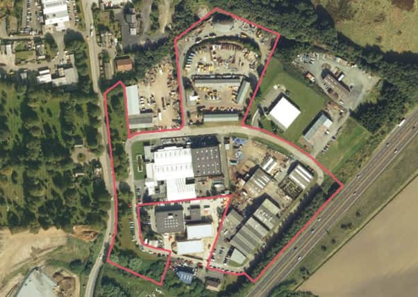 The site plan of the refused redevelopment of Willowburn Trading Estate, for which an appeal is still live. The amended scheme removes the outcrop of land to the north.