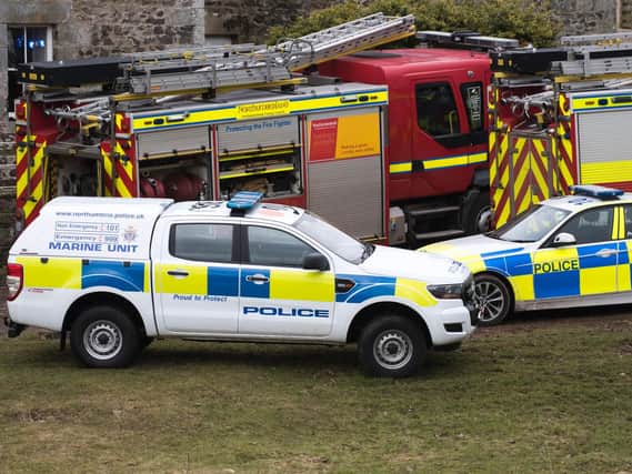 Some of the emergency vehicles near the scene of the search. Picture by Ian Glendinning
